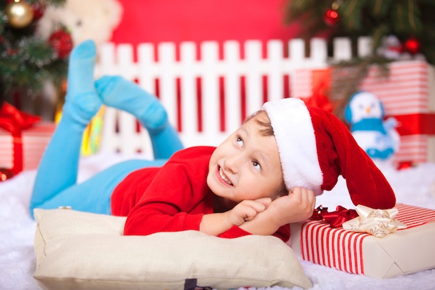 Little boy near the Christmas tree