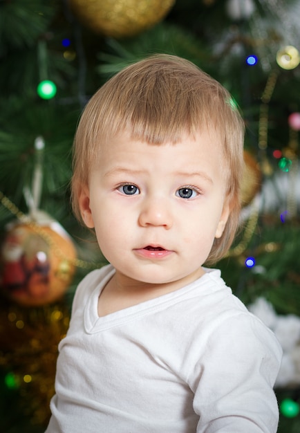 little boy in new year interior