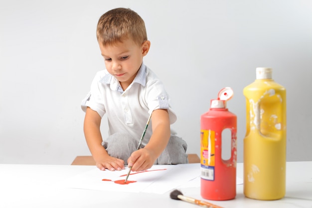 Little boy painting