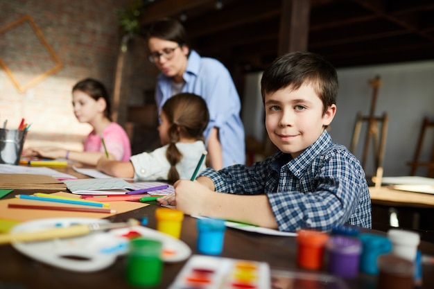 Little Boy Posing in Art Class