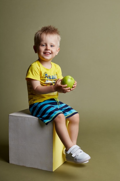 Little boy posing, cheerful emotions boy model