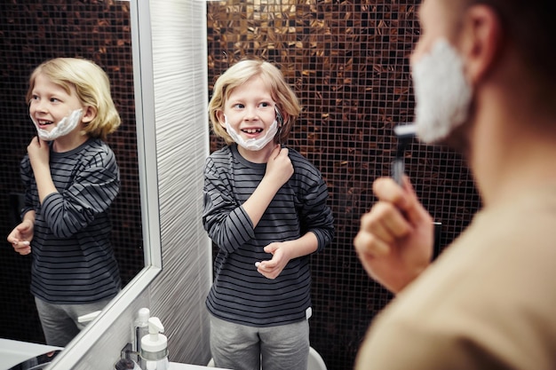 Little Boy Shaving with Father