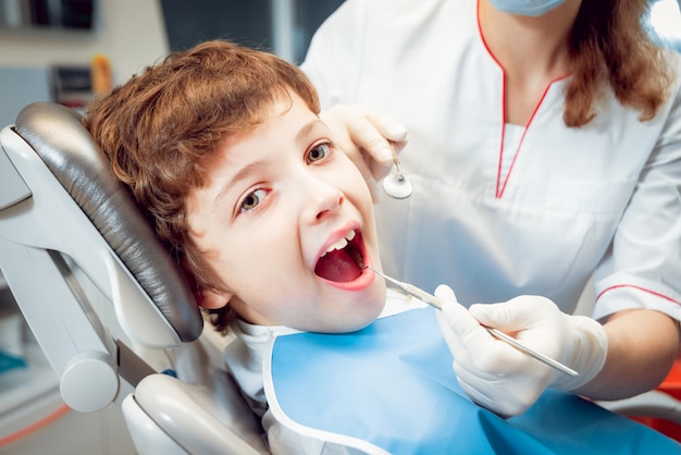 Little boy smiling in the dental office.