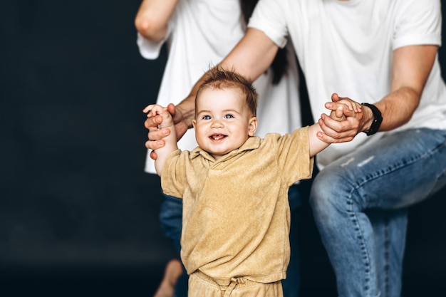 Little Boy Standing in Front of a Group of People