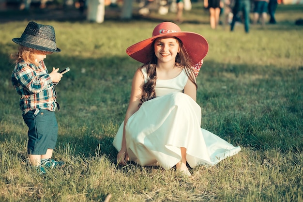 Little boy and stylish girl