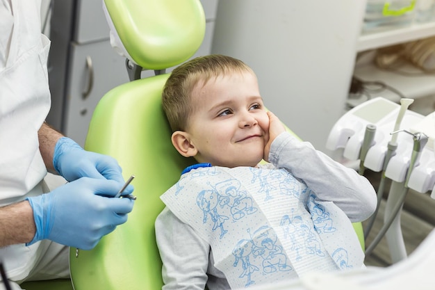 Little boy suffering from toothache Dental problem