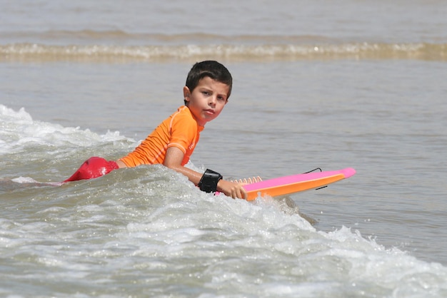 Little boy surfing