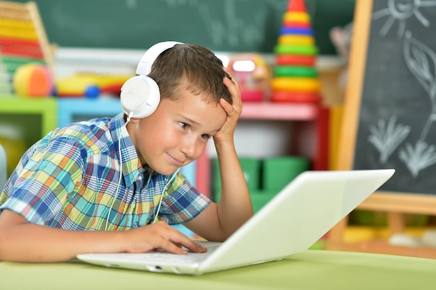 Little boy using laptop