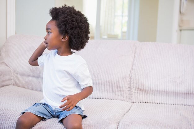 Little boy using a technology and phoning 