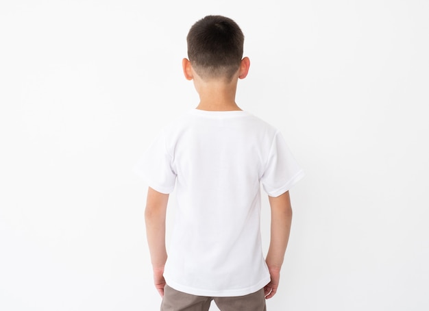 Little boy wearing blank white tshirt