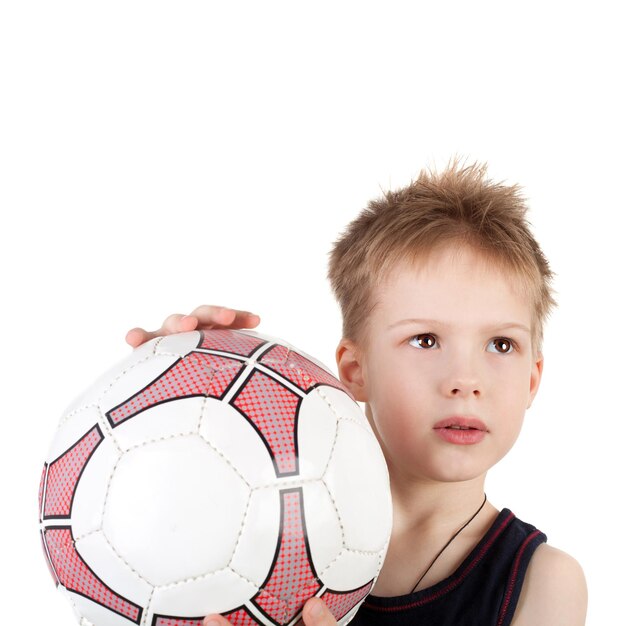 Little boy with ball on white background