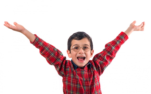 Little boy with eyeglasses raised his hands up