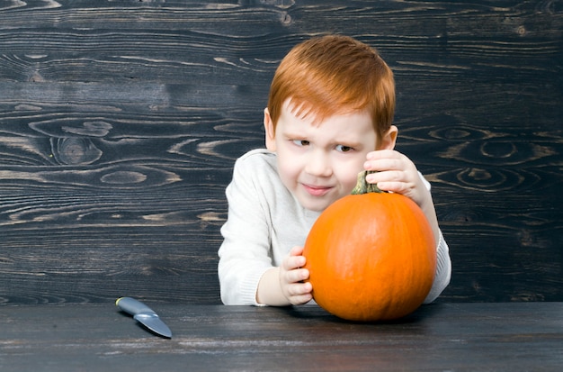 A little boy with red hair