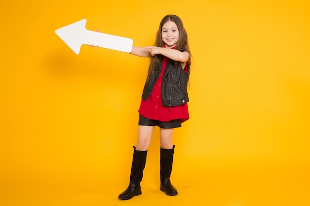 Little brunette girl with pointer