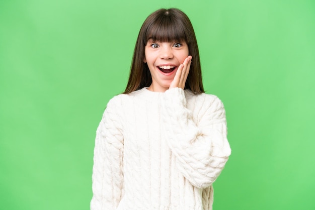 Little caucasian girl over isolated background with surprise and shocked facial expression