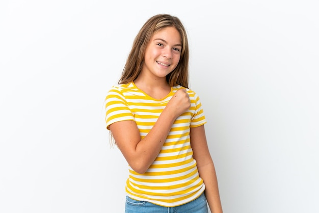 Little caucasian girl isolated on white background celebrating a victory