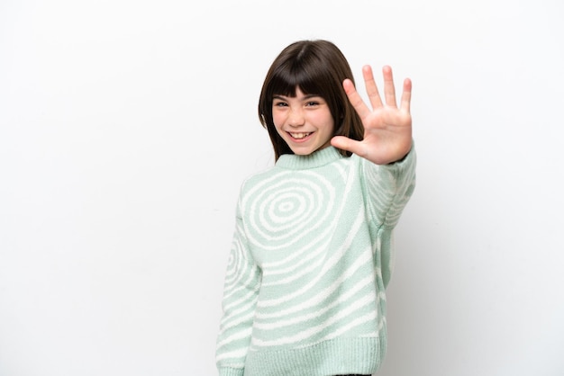 Little caucasian girl isolated on white background counting five with fingers