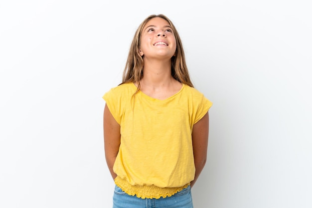 Little caucasian girl isolated on white background laughing