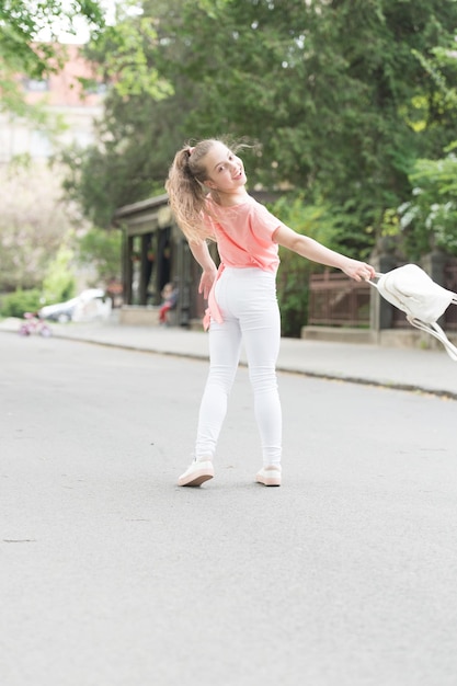 Little child enjoy walk Health good mood and positive energy Energetic child Save energy for long walk Full of energy Girl carefree child Kid long hair enjoy walking Summer holidays