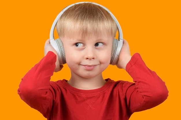 little child listening to music