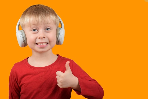 little child listening to music