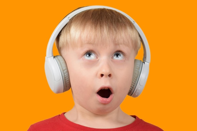 little child listening to music