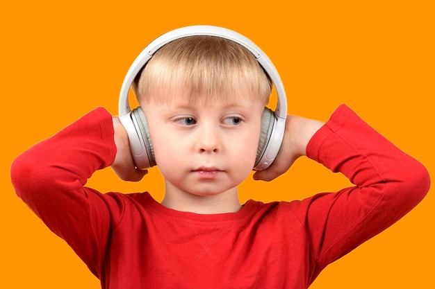 little child listening to music