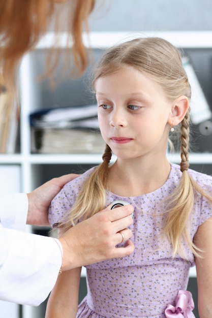 Little child at pediatrician reception. Physical exam appointment, cute infant portrait, baby aid, healthy lifestyle, ward round, child sickness, clinic test, high quality and trust concept