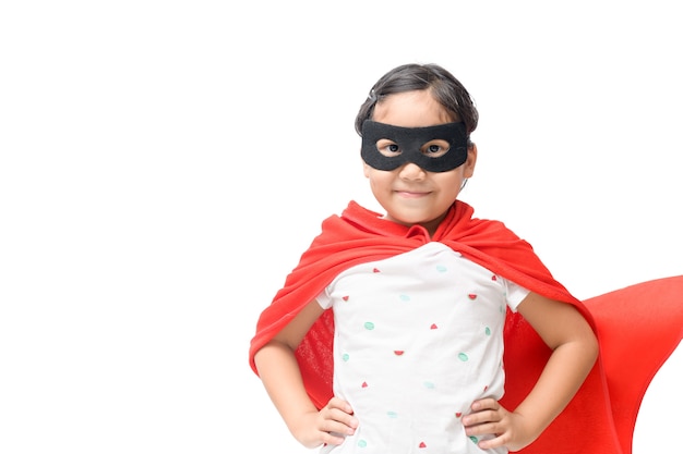 Little child plays superhero isolated 