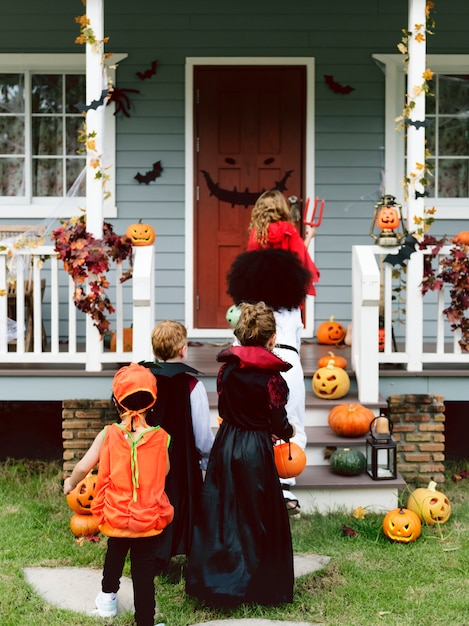 Little children trick or treating