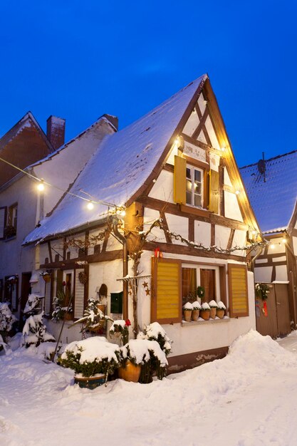 Little Christmassy House At Night With Snow