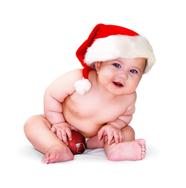 Little cute baby with santa hat on white background