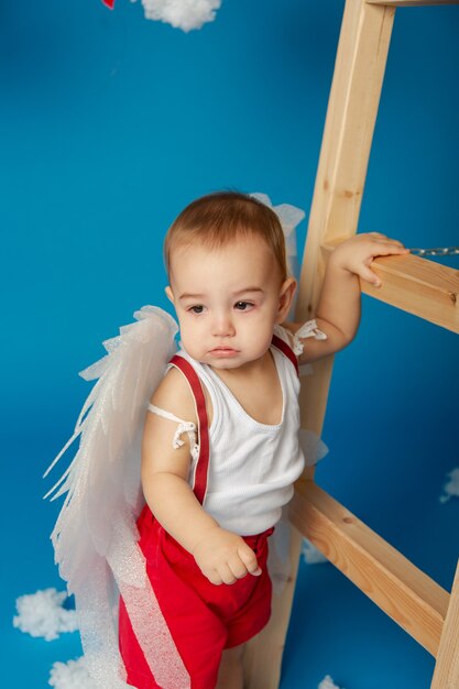 Little cute boy with wings for valentine's day