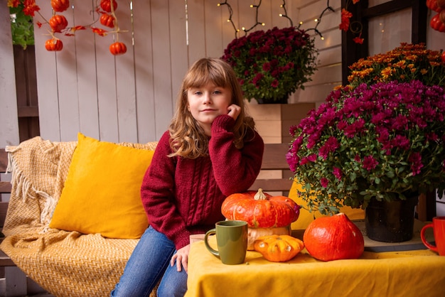 little cute girl on the street in autumn child portrait