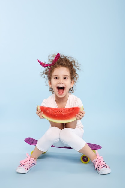 Little cute girl with her mouth open