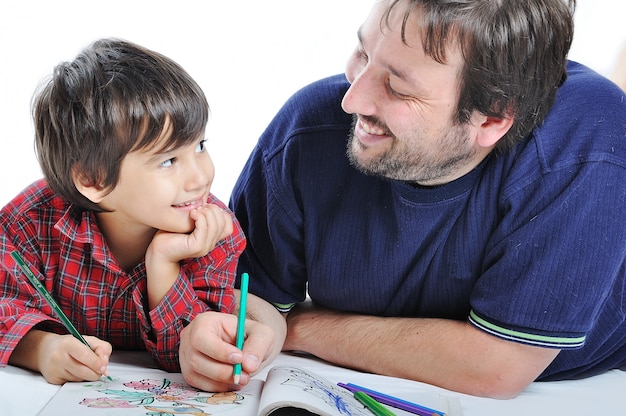 A little cute kid painting on white background