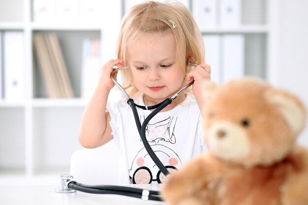 Photo little girl after health examining