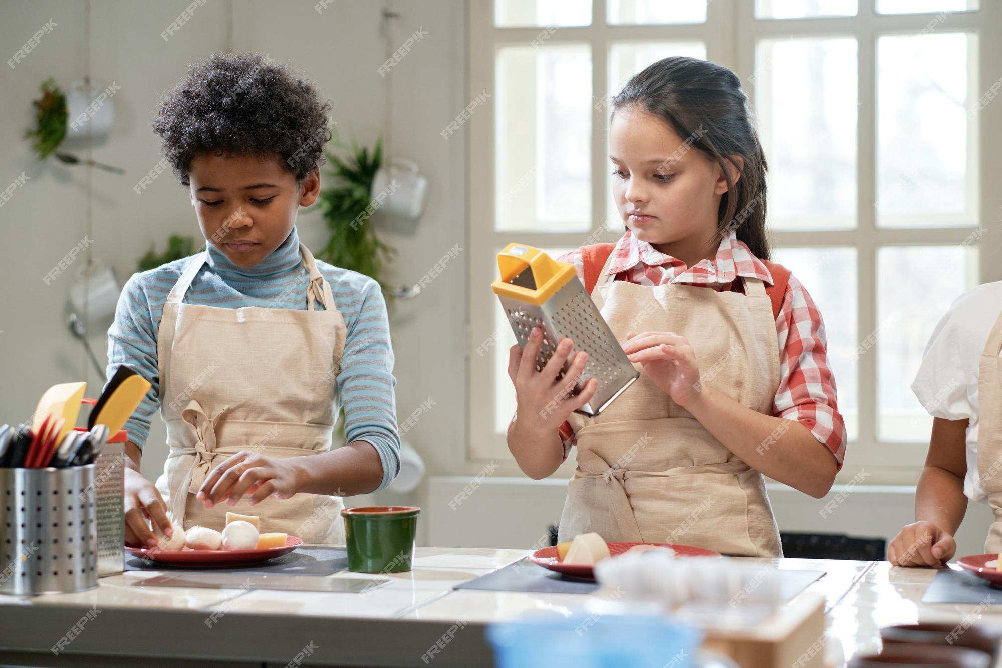 Free Photos - Two Women Wearing Aprons, Working Together In A Kitchen As  They Prepare A Meal. They Are Surrounded By Various Cooking Utensils And  Equipment, Including A Knife, A Spoon, And