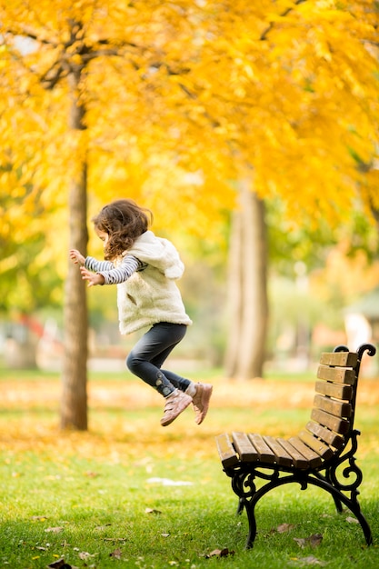 Little girl at the bench