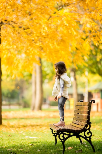 Little girl at the bench