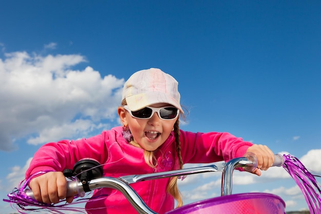 Little girl on bicycle