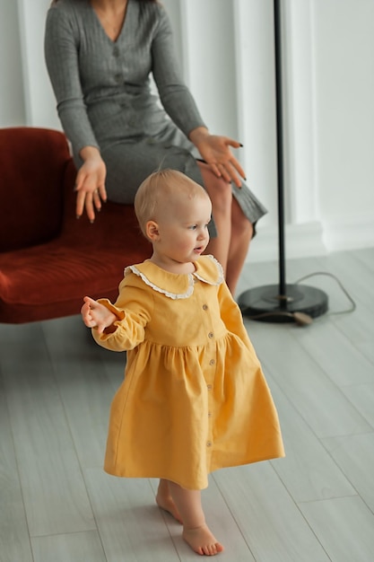 little girl in bright room family portrait