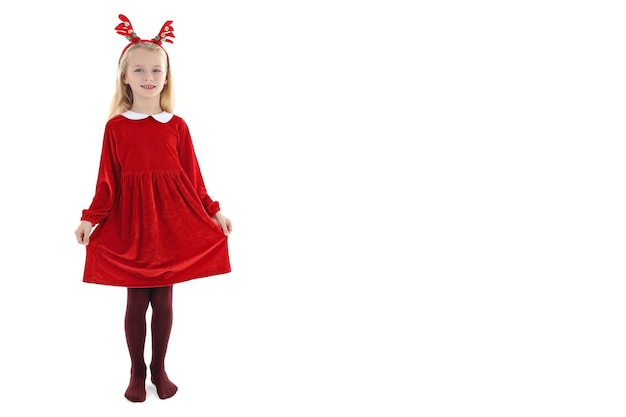 Little girl in Christmas clothes isolated on white background