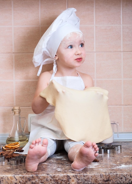 little girl in the cook costume