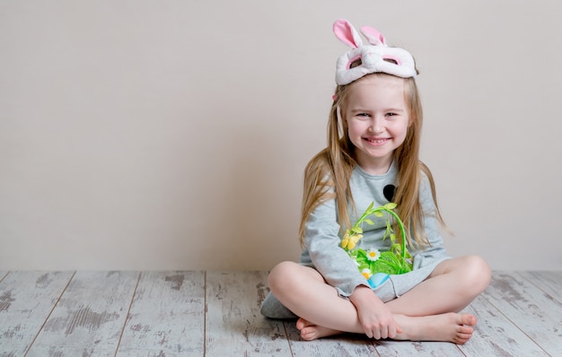 Little girl in Easter bunny costume