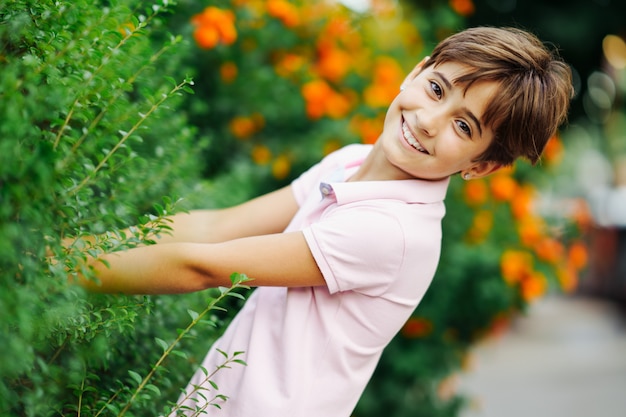 Little girl, eight years old, having fun in an urban park.