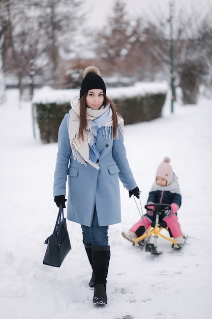 Little girl enjoying sledding