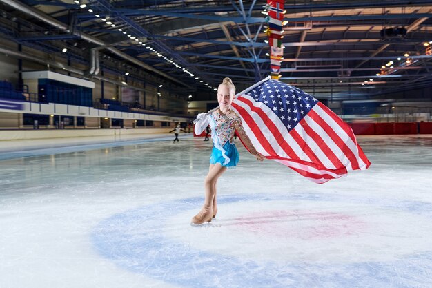 Little Girl Figure-Skating with American Flag