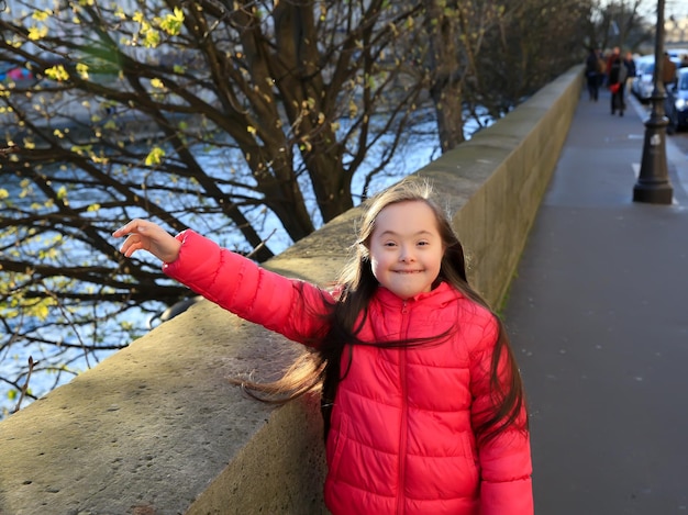 Little girl have fun on the Paris street