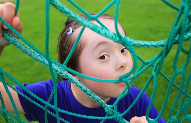 Little girl have fun on the stadium